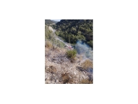 Toroslu:Yangına karadan da müdahale edilebilmesi için şu anda dozerlerle şerit açılmaya çalışılıyor